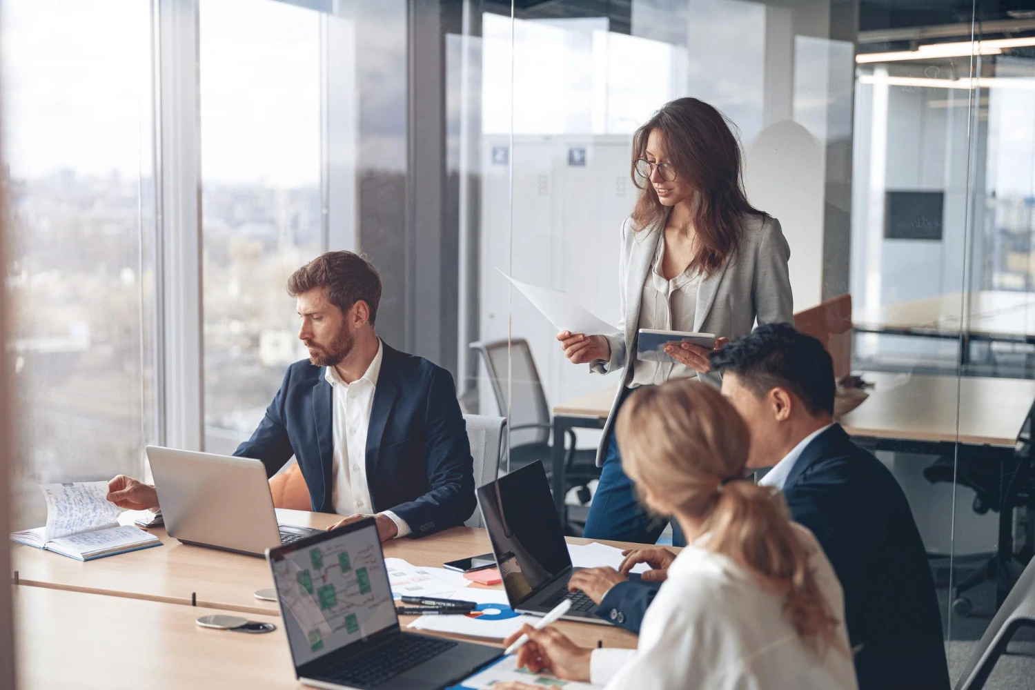 Salespeople working in the FutureMeets open-plan office